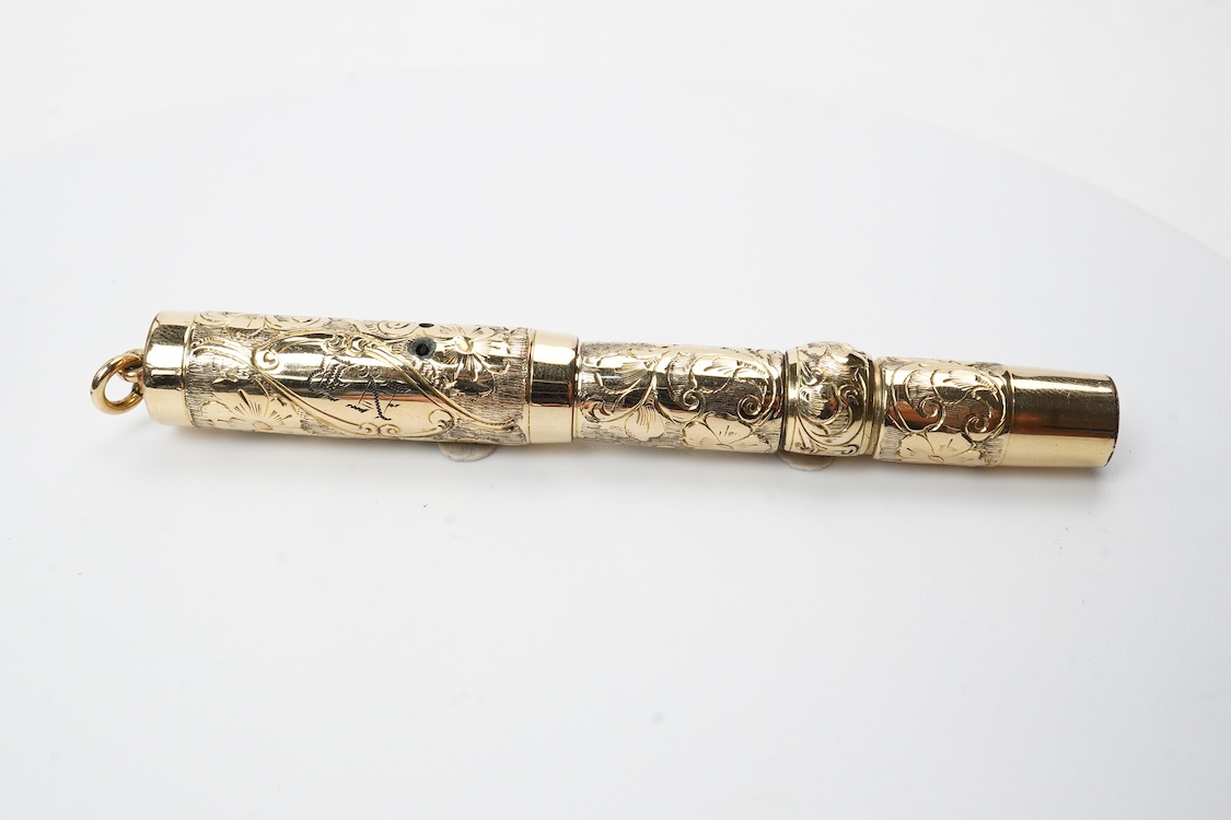 A Conklin ring top hand engraved crescent filler fountain pen with 14ct. gold Conklin flexible nib